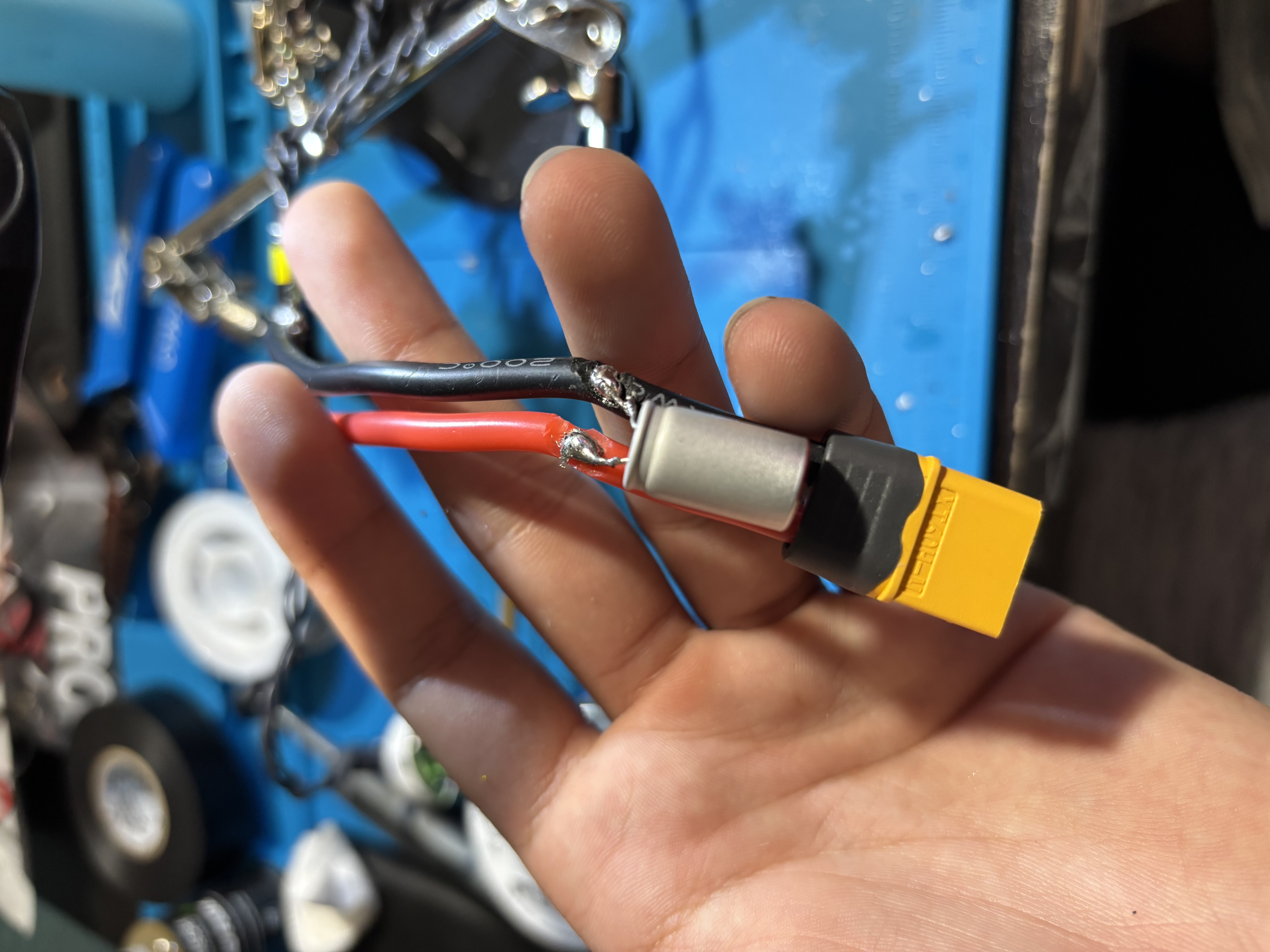 XT60 connector soldered to the battery power leads alongside a low-ESR capacitor